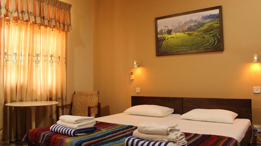 Janishi Residencies Hotel Negombo Ruang foto
